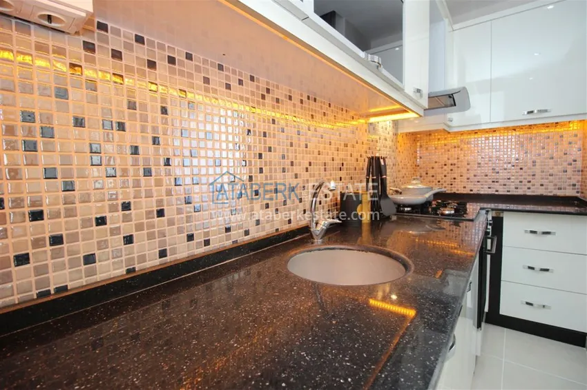 Приобрести Квартира в Махмутларе с мебелью по доступной цене рядом с морем 13 