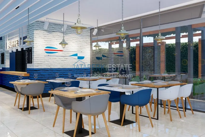 Двухкомнатная квартира в центре Алании с частичным видом на море в строящемся комплексе  14 