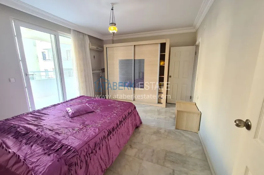 Приобрести Трехкомнатная квартира в Махмутларе, с мебелью рядом с морем 12 