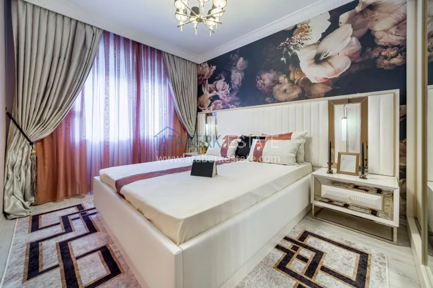 Приобрести Квартира в Махмутларе трехкомнатная со стильным интерьером  12 