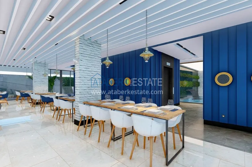 Двухкомнатная квартира в центре Алании с частичным видом на море в строящемся комплексе  16 