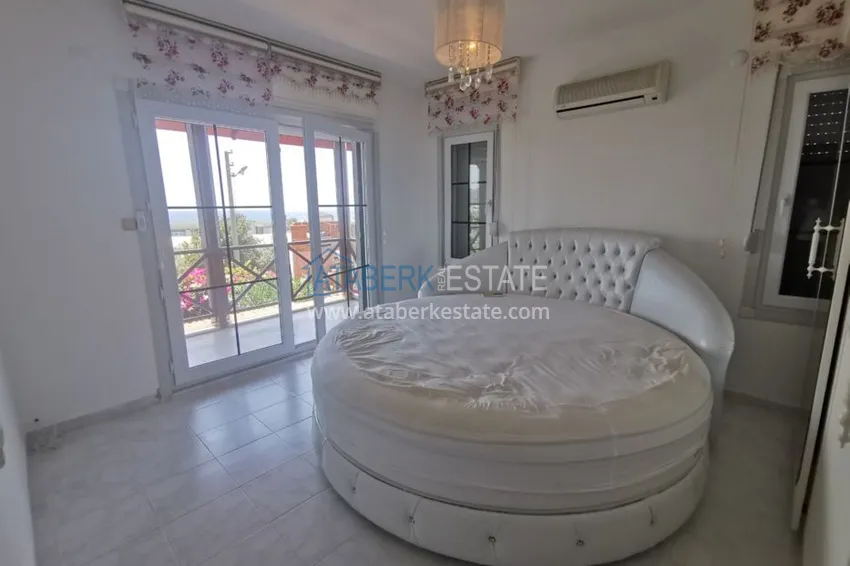 Приобрести Вилла в районе Демирташ с мебелью, садиком и великолепным видом на море  17 