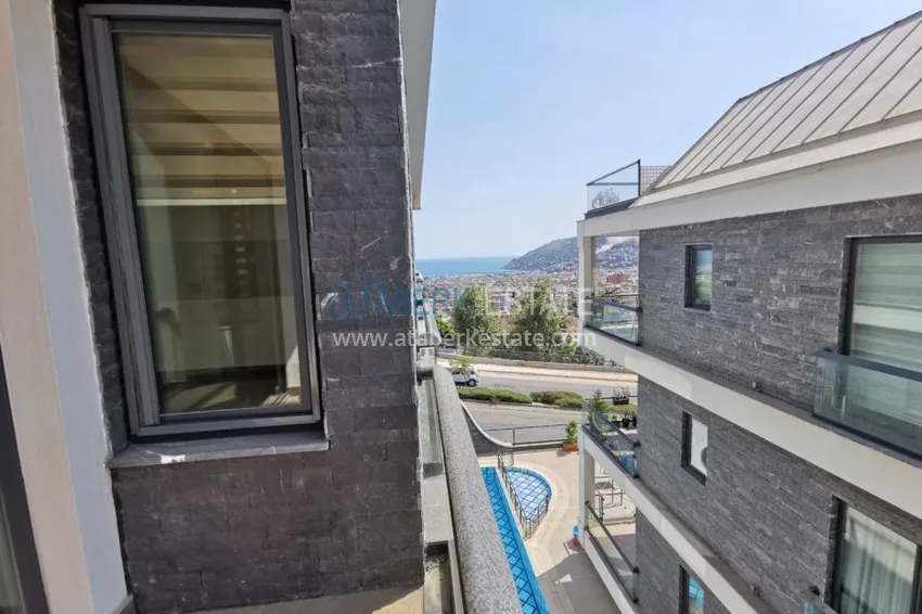 Приобрести Видовая квартира в центре Алании в эксклюзивном комплексе  15 