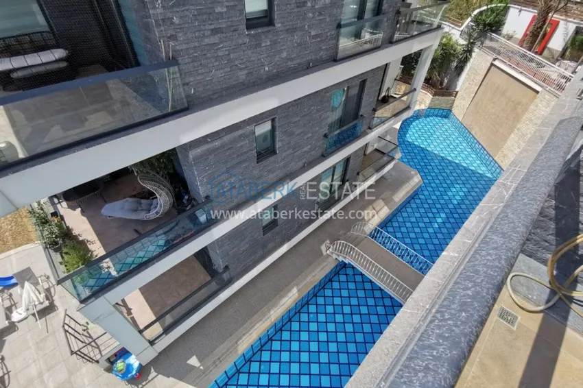 Приобрести Видовая квартира в центре Алании в эксклюзивном комплексе  16 