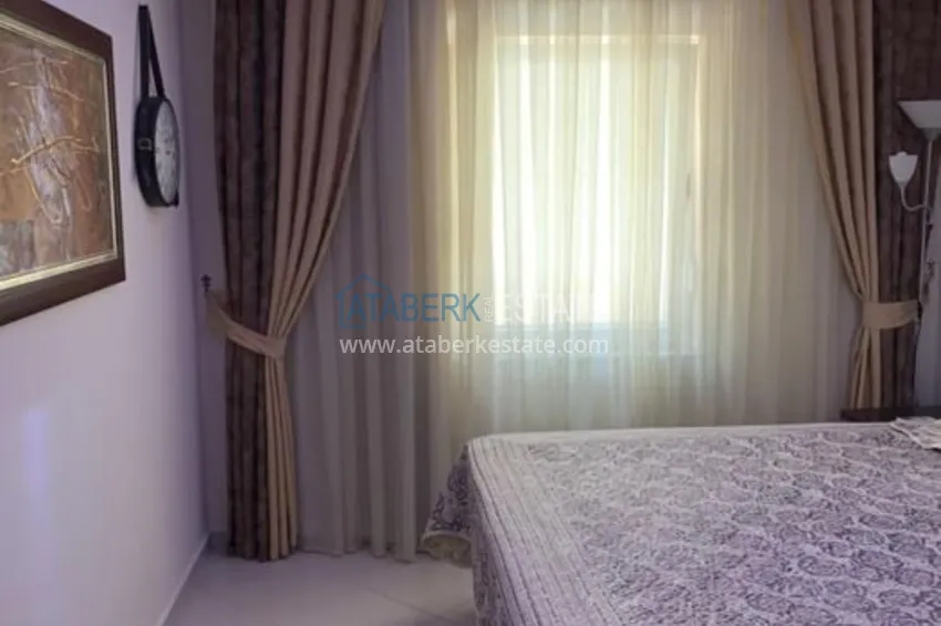 Приобрести Трехкомнатная квартира в Алании с мебелью в районе пляжа Клеопатра 16 