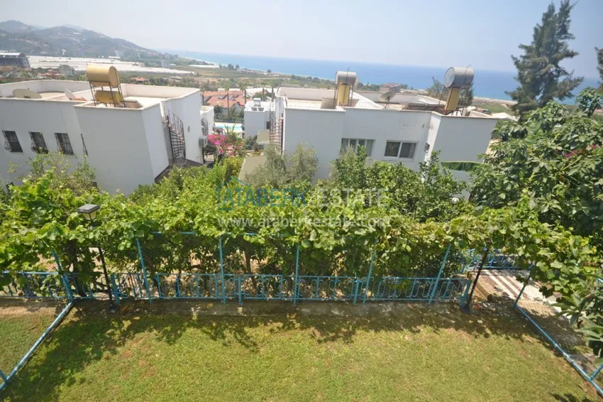 Приобрести Трехуровневая смежная вилла в районе Демирташ с собственным садом 17 