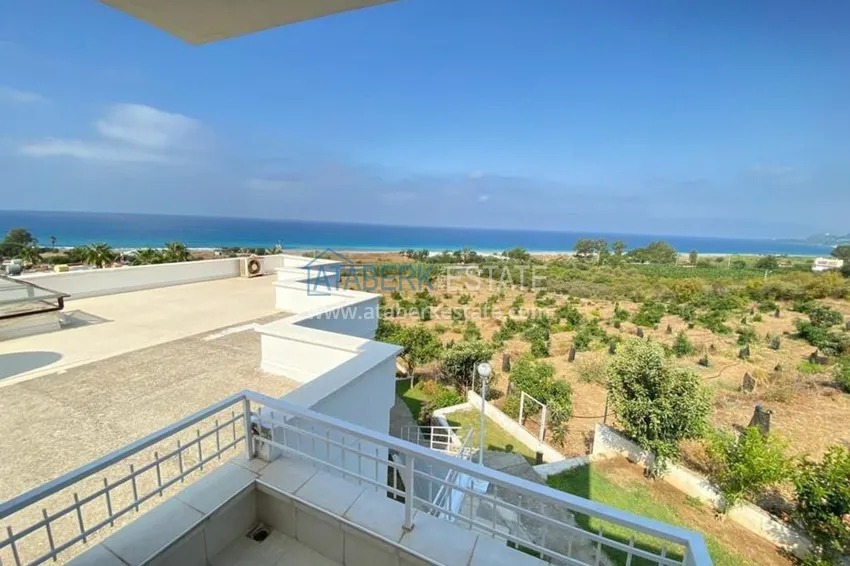 Приобрести Таунхаус в районе Демирташ с мебелью и открытым видом на море  15 