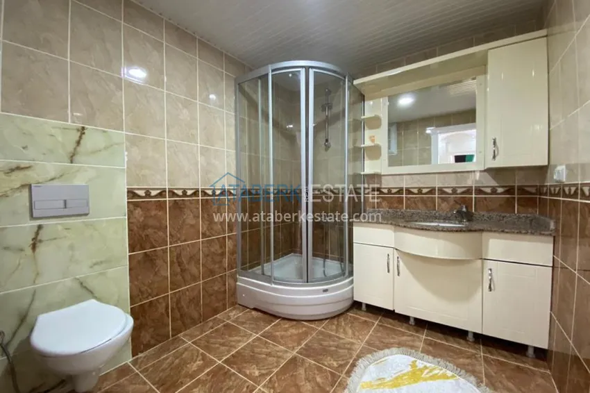 Приобрести Квартира в Махмутларе с современным интерьером, в комплексе рядом с морем 15 