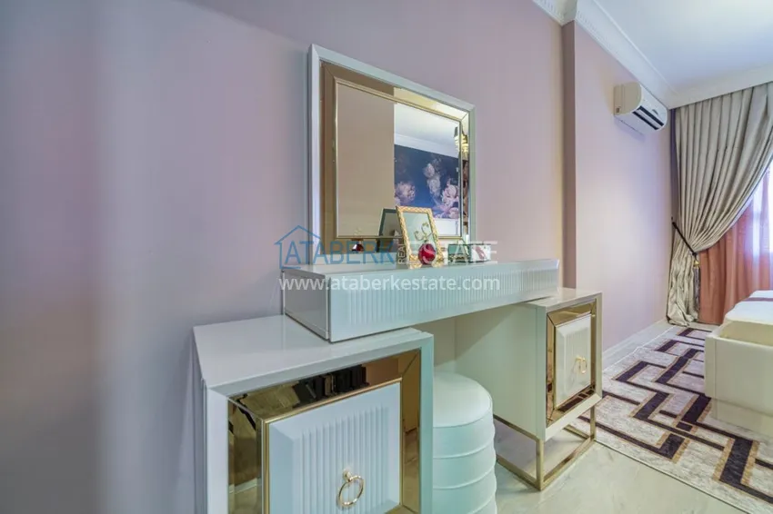 Приобрести Квартира в Махмутларе трехкомнатная со стильным интерьером  15 