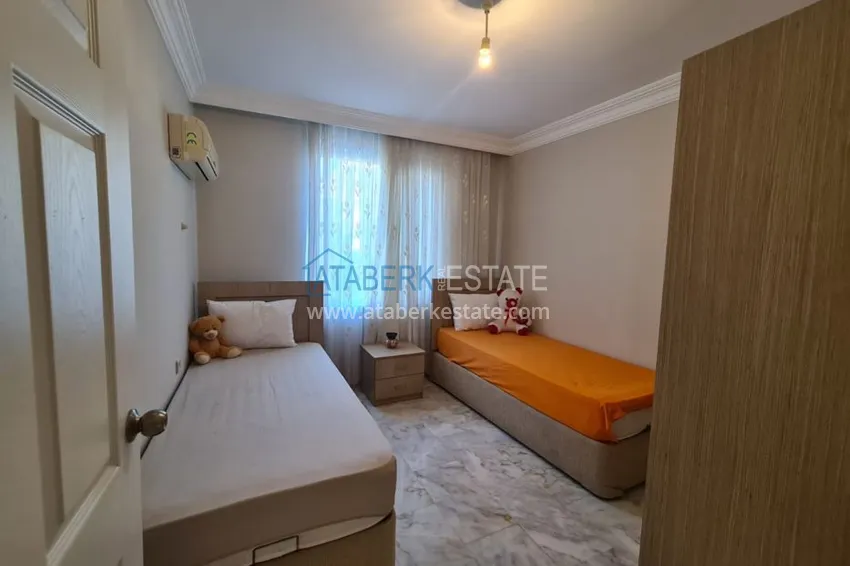 Приобрести Трехкомнатная квартира в Махмутларе, с мебелью рядом с морем 16 