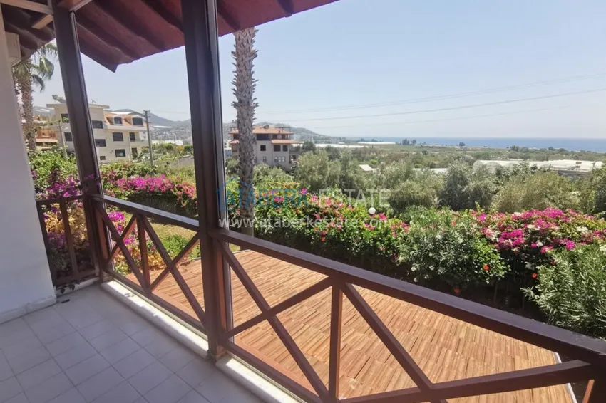 Приобрести Вилла в районе Демирташ с мебелью, садиком и великолепным видом на море  20 