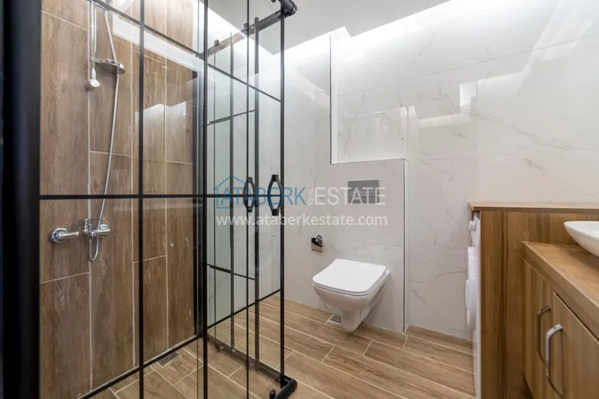 Приобрести Квартира в Махмутларе трехкомнатная со стильным интерьером  16 