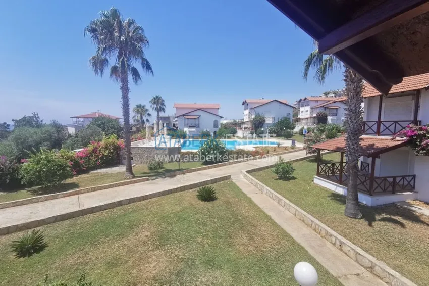 Приобрести Вилла в районе Демирташ с мебелью, садиком и великолепным видом на море  21 