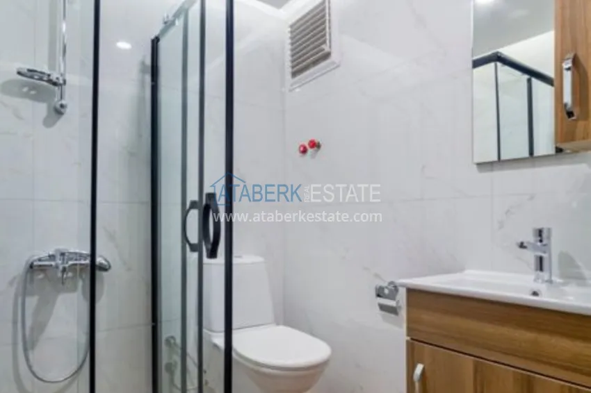 Приобрести Квартира в Махмутларе трехкомнатная со стильным интерьером  17 