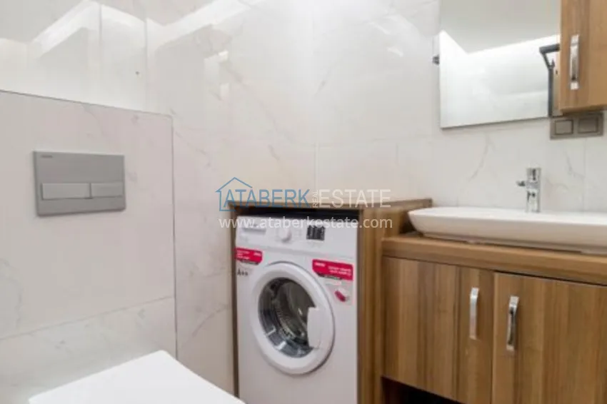 Приобрести Квартира в Махмутларе трехкомнатная со стильным интерьером  18 