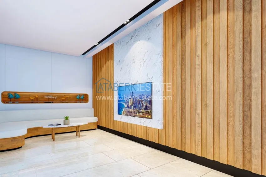 Двухкомнатная квартира в центре Алании с частичным видом на море в строящемся комплексе  21 