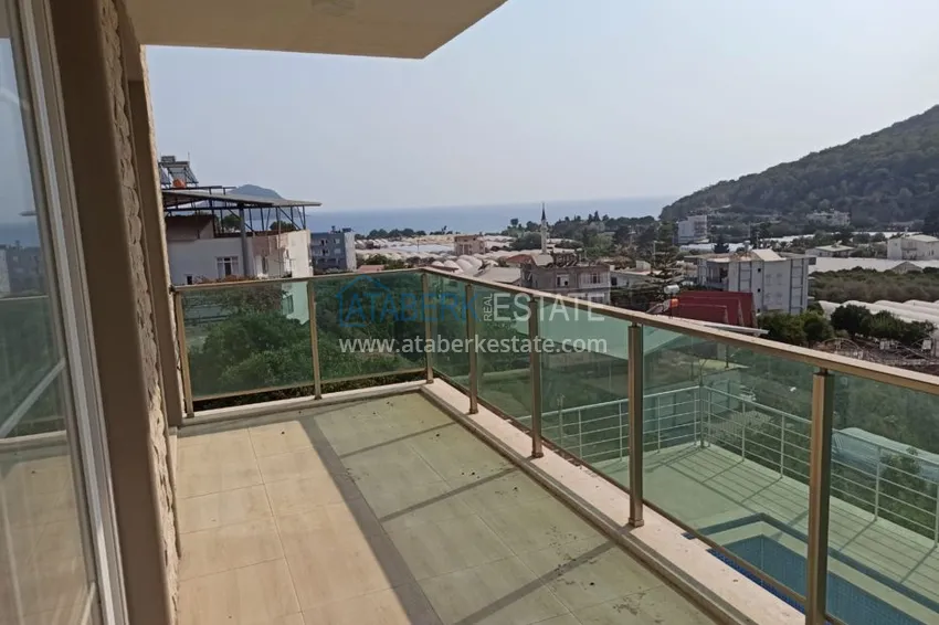 Приобрести Виллы в Кемере, район Кумлуджа с видом на горы и море  18 