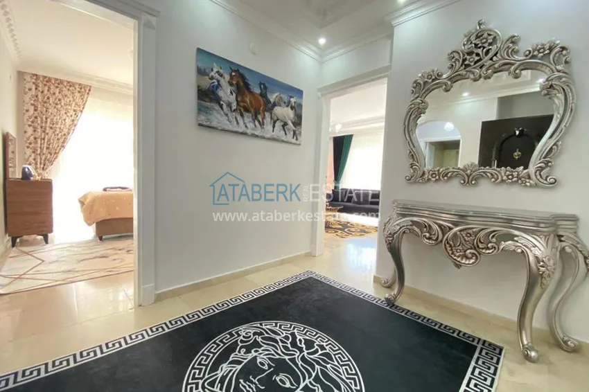 Приобрести Квартира в Махмутларе с современным интерьером, в комплексе рядом с морем 1 