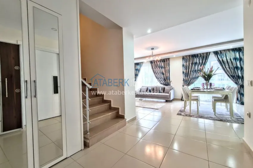 Приобрести Двухуровневая квартира в Кестеле с новой мебелью и видом на море 1 