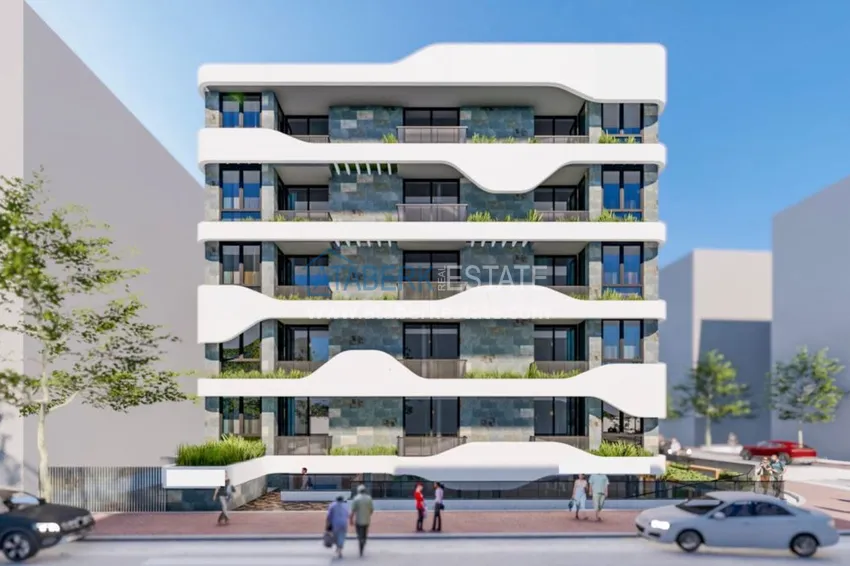 Двухкомнатная квартира в центре Алании с частичным видом на море в строящемся комплексе  1 