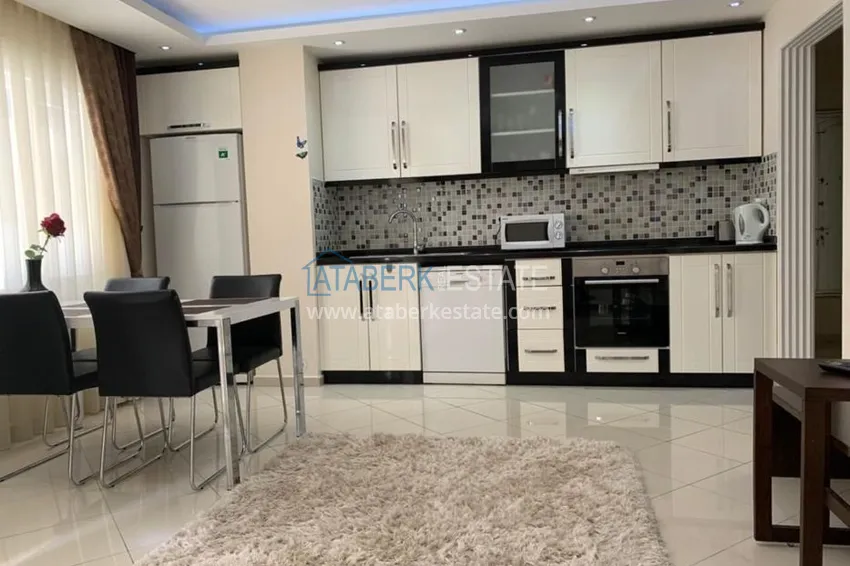 Приобрести Трехкомнатная квартира в Алании с мебелью в районе пляжа Клеопатра 1 