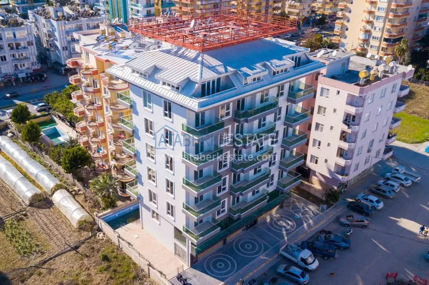 Квартира в Махмутларе с новой мебелью в центре района рядом с морем 1 