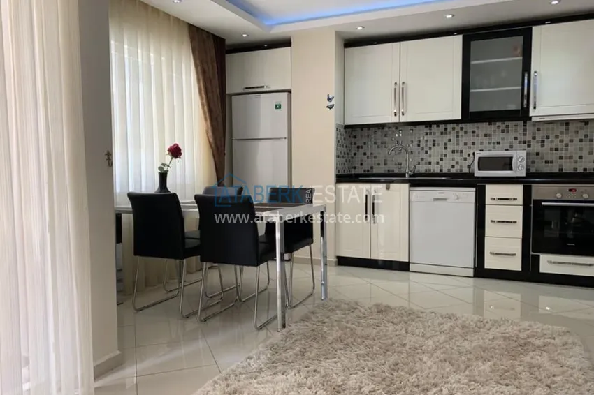 Приобрести Трехкомнатная квартира в Алании с мебелью в районе пляжа Клеопатра 2 