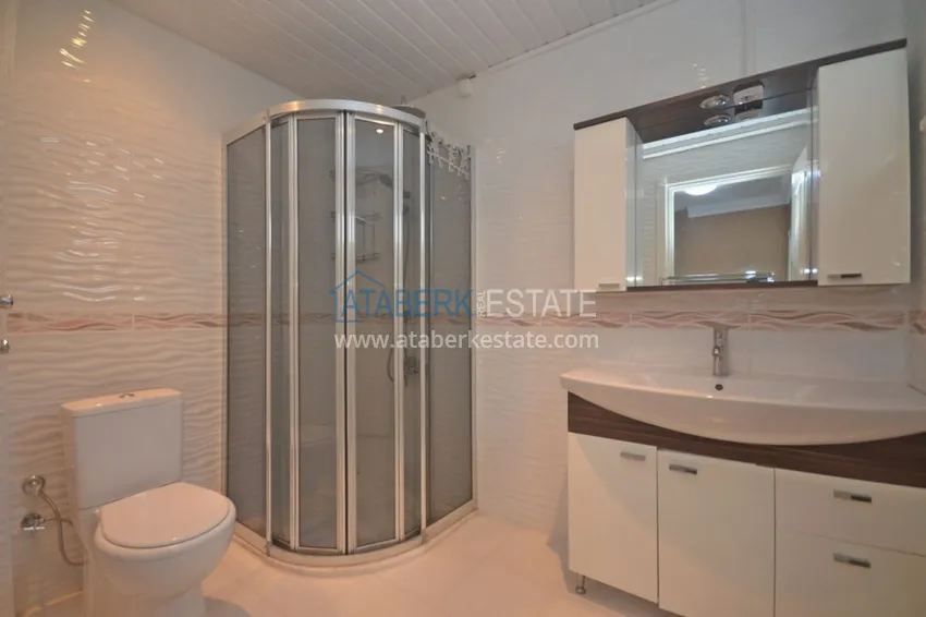 Приобрести Трехуровневая смежная вилла в районе Демирташ с собственным садом 24 