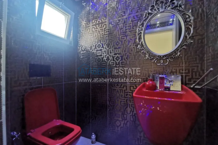 Приобрести Вилла в районе Демирташ с мебелью, садиком и великолепным видом на море  24 