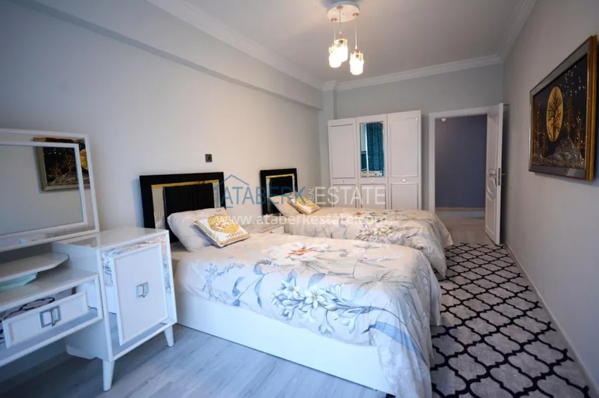 Приобрести Квартира в Махмутларе с современной новой мебелью на центральной улице 23 