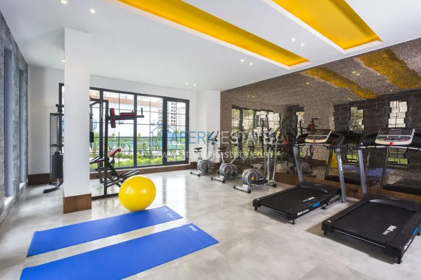 Квартира с мебелью в Махмутларе в благоустроенном комплексе 33 