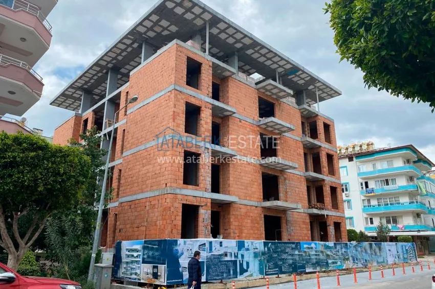 Двухкомнатная квартира в центре Алании с частичным видом на море в строящемся комплексе  2 