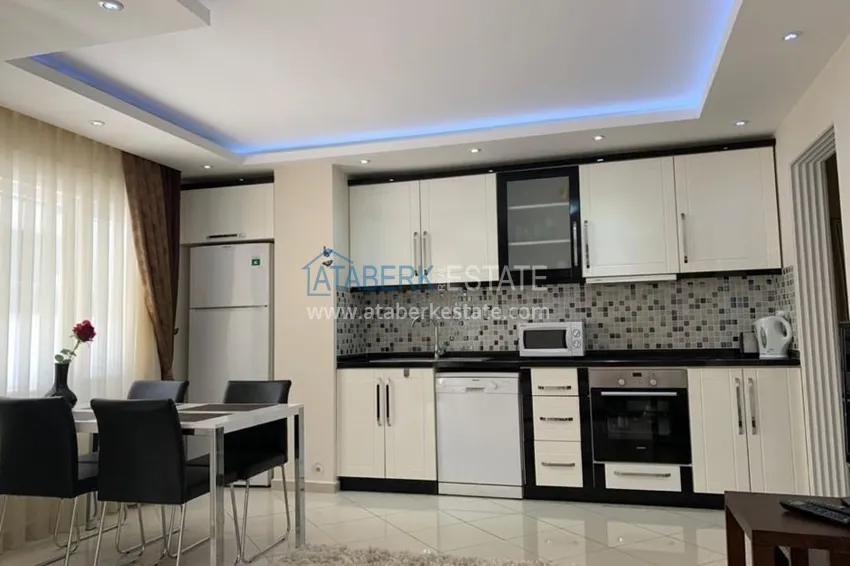 Приобрести Трехкомнатная квартира в Алании с мебелью в районе пляжа Клеопатра 3 