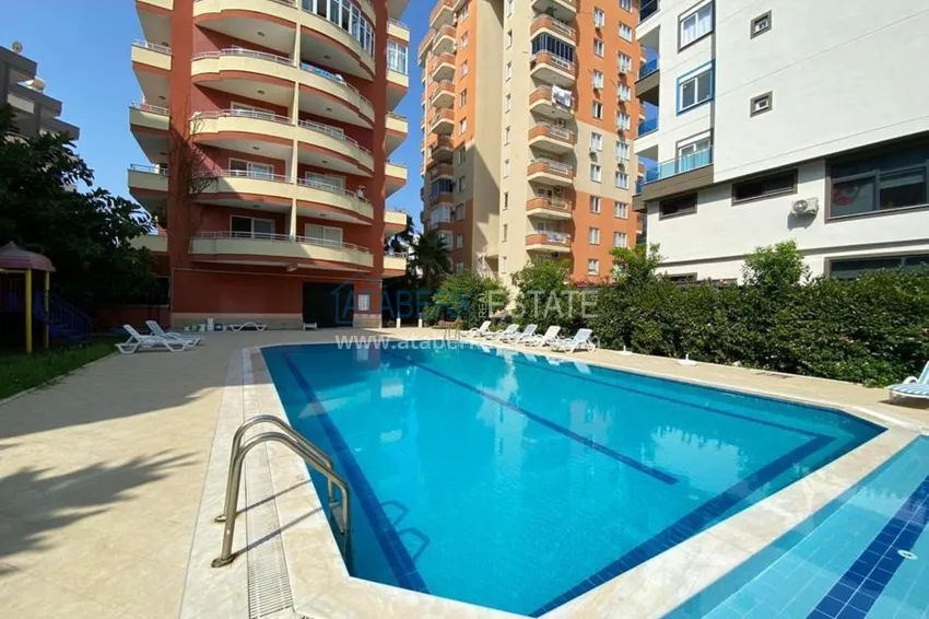 Квартира в центре Махмутлара с 3 балконами и частичным видом на море 2 