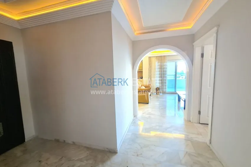 Приобрести Трехкомнатная квартира в Махмутларе, с мебелью рядом с морем 2 