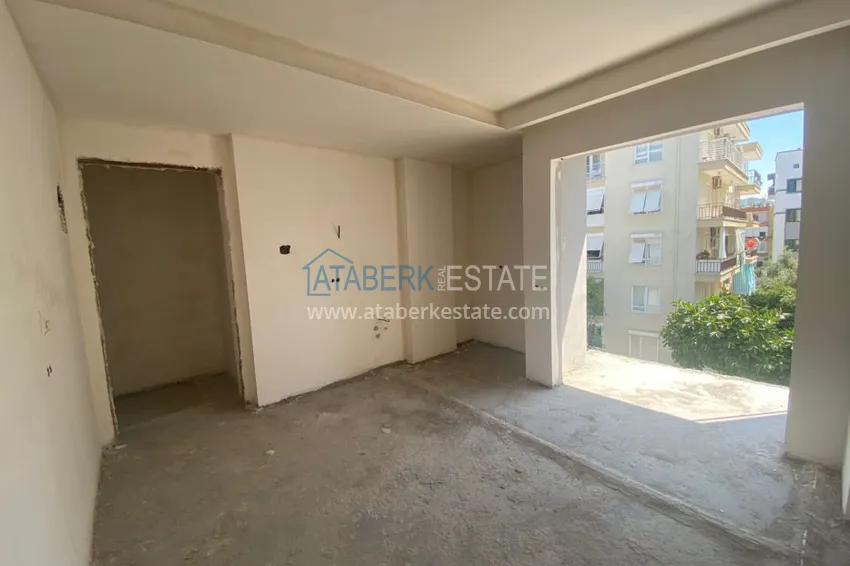 Приобрести Двухкомнатная квартира в центре Алании с частичным видом на море в строящемся комплексе  2 