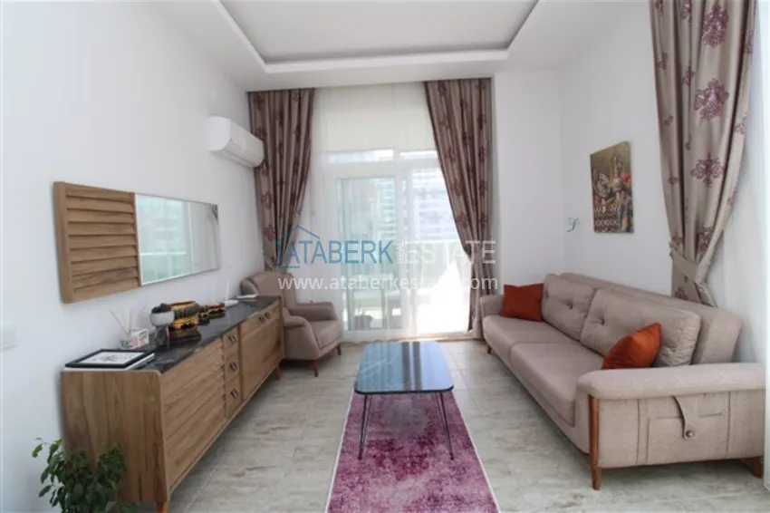 Приобрести Квартира в Махмутларе с новой мебелью в центре района рядом с морем 3 