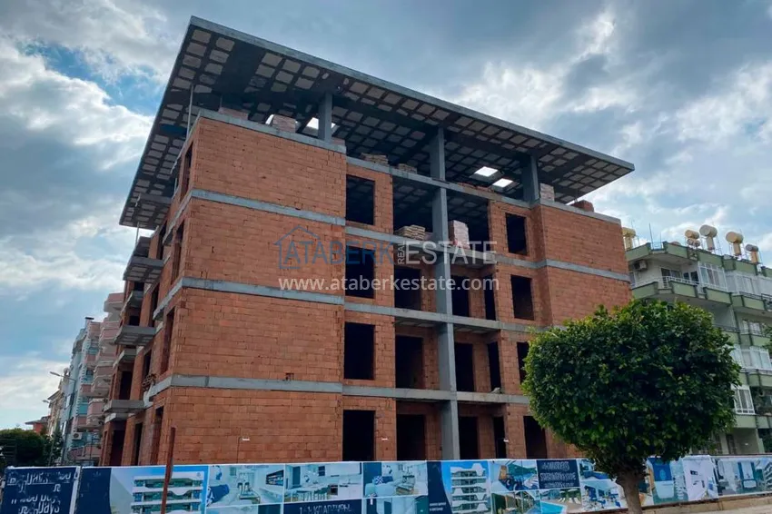 Двухкомнатная квартира в центре Алании с частичным видом на море в строящемся комплексе  3 