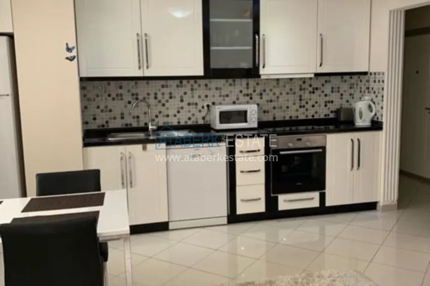 Приобрести Трехкомнатная квартира в Алании с мебелью в районе пляжа Клеопатра 4 