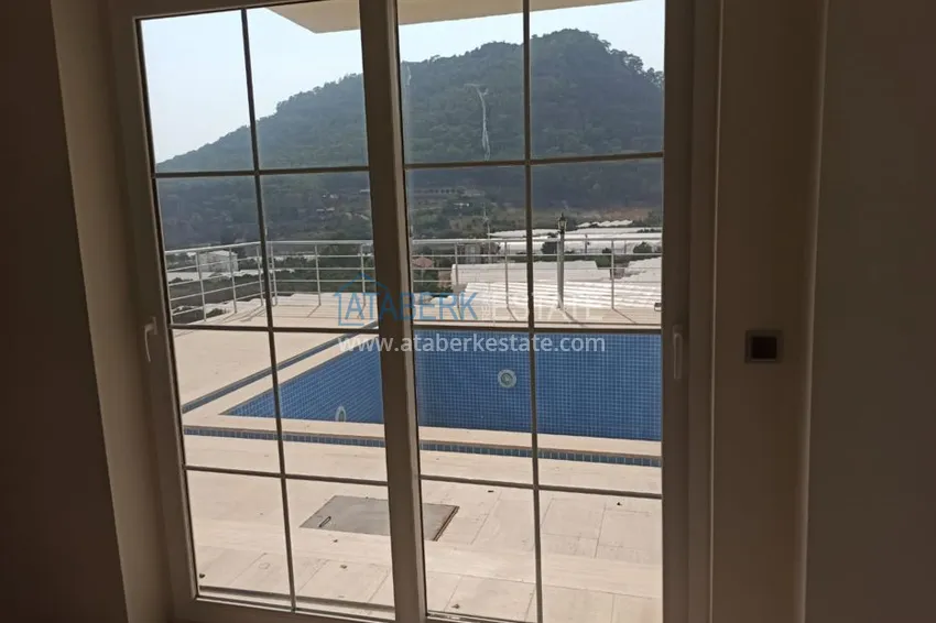 Приобрести Виллы в Кемере, район Кумлуджа с видом на горы и море  3 