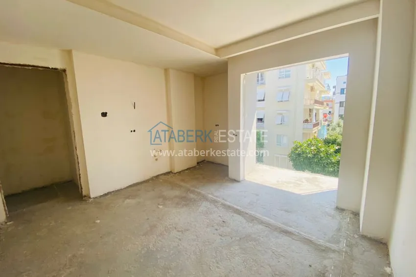 Приобрести Двухкомнатная квартира в центре Алании с частичным видом на море в строящемся комплексе  3 