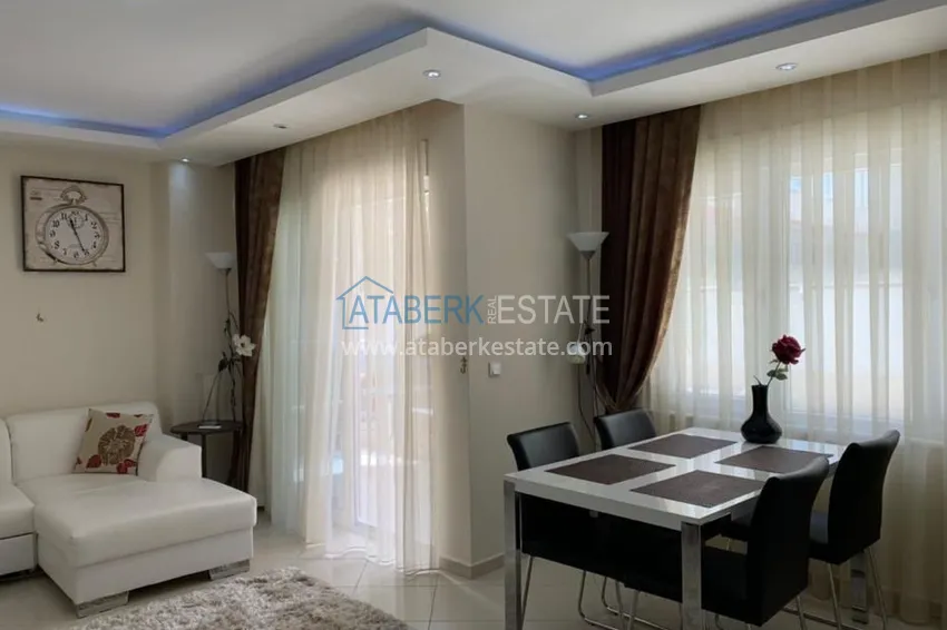 Приобрести Трехкомнатная квартира в Алании с мебелью в районе пляжа Клеопатра 6 