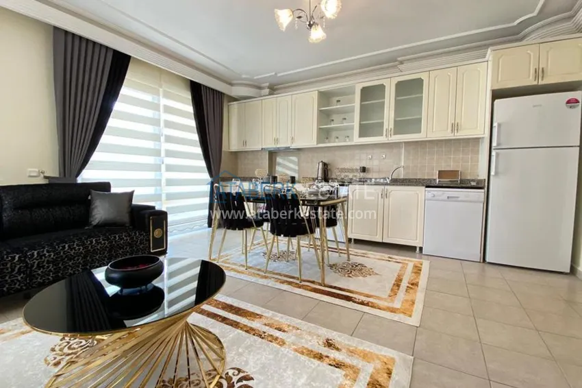 Приобрести Квартира в центре Махмутлара с 3 балконами и частичным видом на море 5 