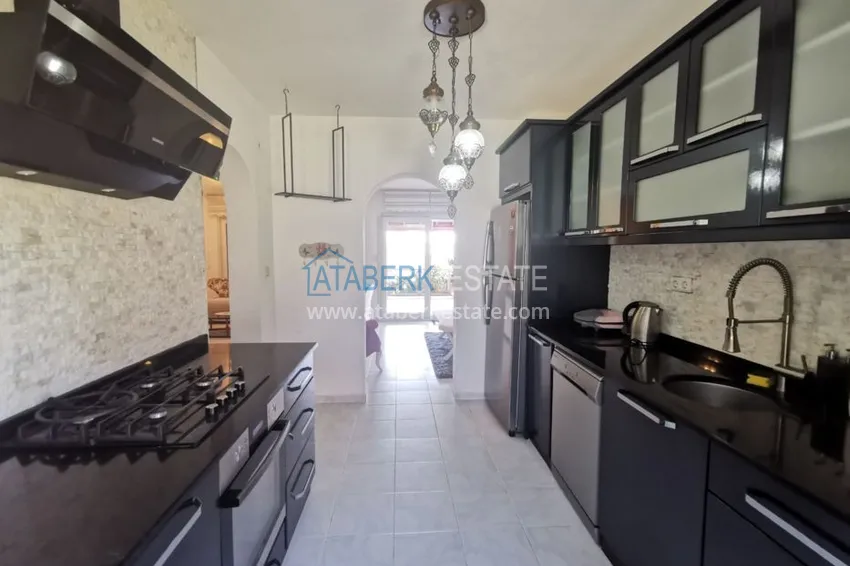 Приобрести Вилла в районе Демирташ с мебелью, садиком и великолепным видом на море  6 