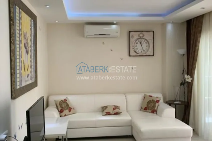 Приобрести Трехкомнатная квартира в Алании с мебелью в районе пляжа Клеопатра 7 