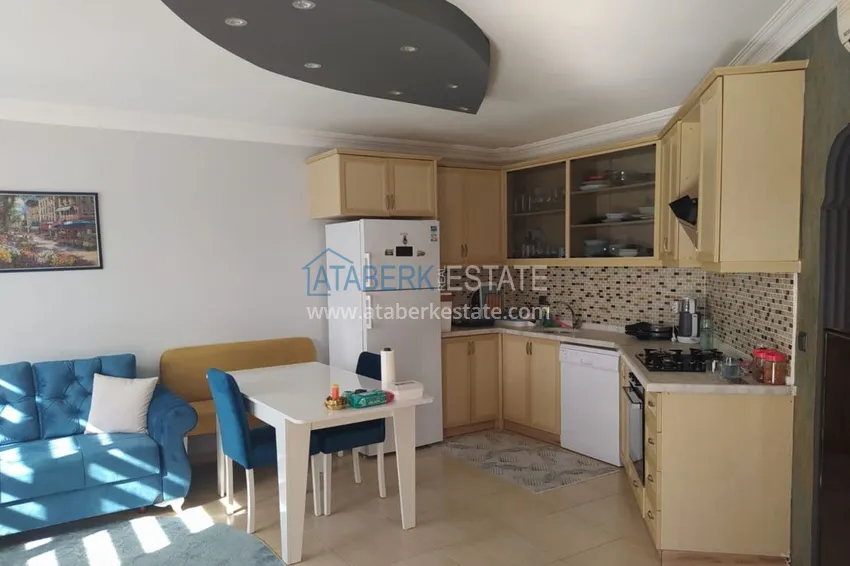 Приобрести Квартира в Тосмуре с мебелью, видом на горы в небольшом комплексе 5 