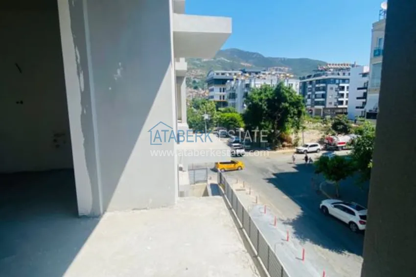 Приобрести Двухкомнатная квартира в центре Алании с частичным видом на море в строящемся комплексе  6 