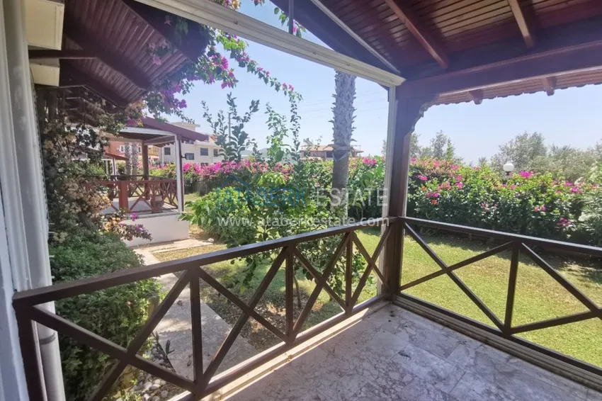 Приобрести Вилла в районе Демирташ с мебелью, садиком и великолепным видом на море  9 