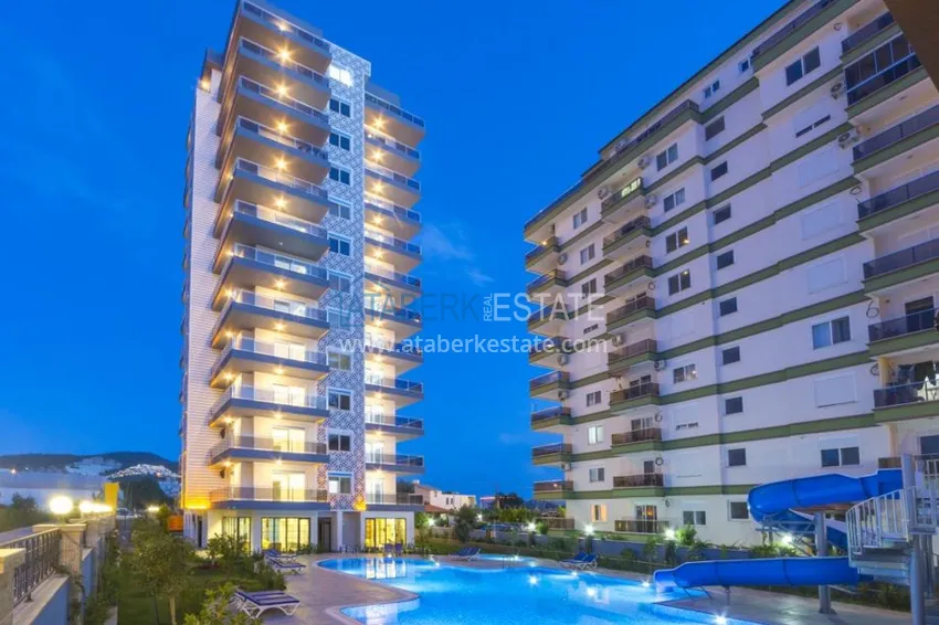 Квартира с мебелью в Махмутларе в благоустроенном комплексе 1 