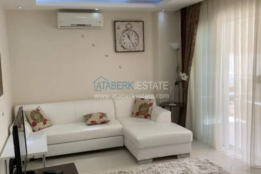 Приобрести Трехкомнатная квартира в Алании с мебелью в районе пляжа Клеопатра 8 